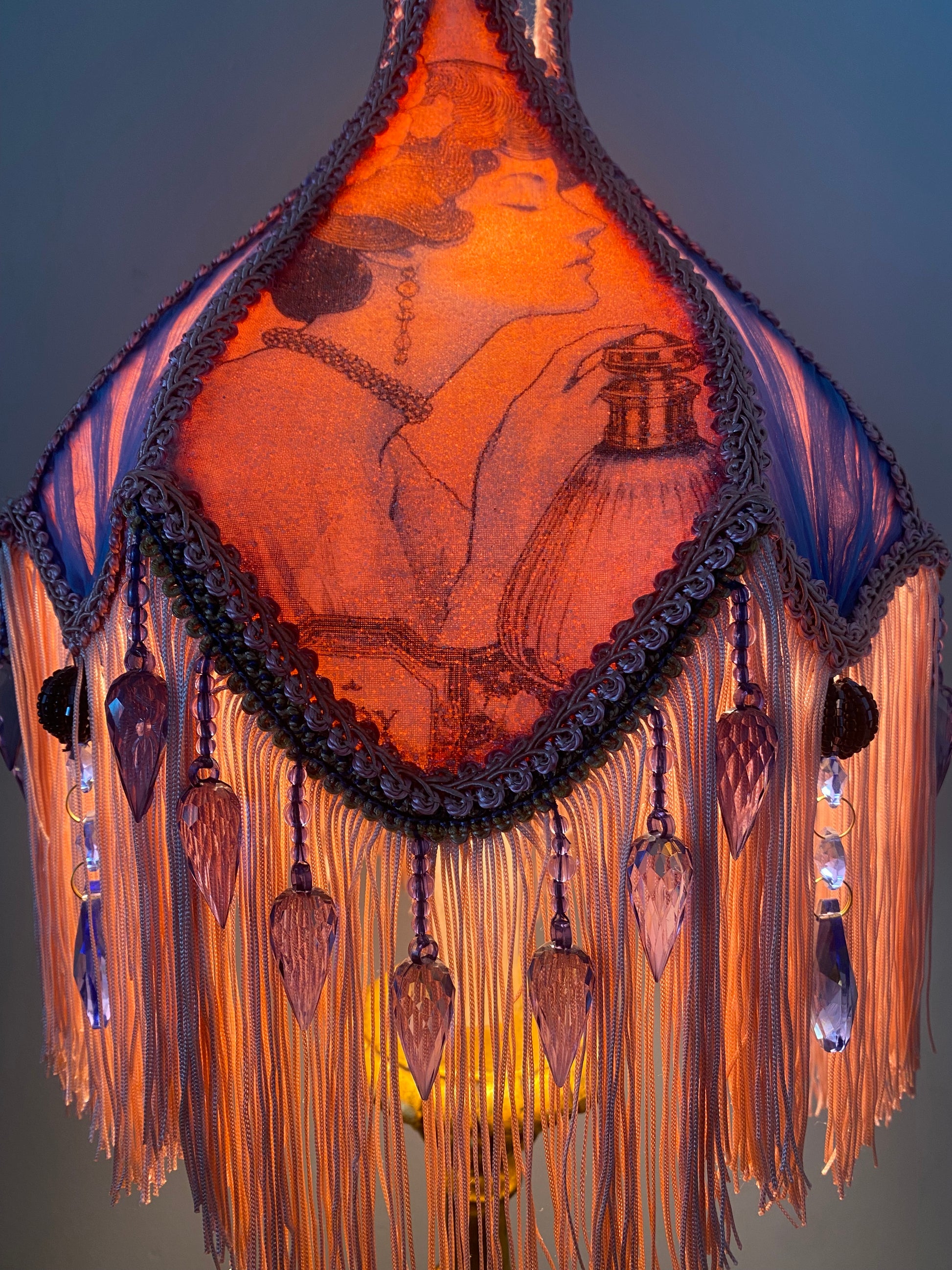 Lit ambience shot – “Victorian tulip-shaped silk lampshade illuminated to reveal Edwardian lady image, lace details, and pastel glow – romantic vintage lighting for elegant interiors.” 2
